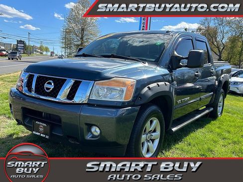 Used 2014 Nissan Titan SV w/ SV Premium Utility Package AWD/4WD image 1