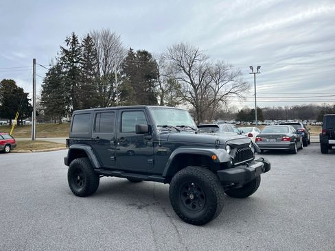 Used 2016 Jeep Wrangler Unlimited Sport image 1