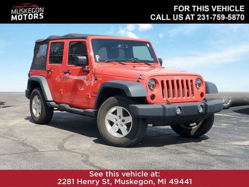 Used 2013 Jeep Wrangler Unlimited Sport AWD/4WD image 1