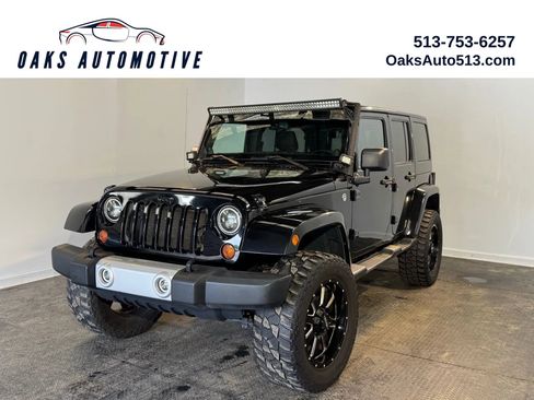 Used 2013 Jeep Wrangler Unlimited Sahara w/ Connectivity Group AWD/4WD image 1
