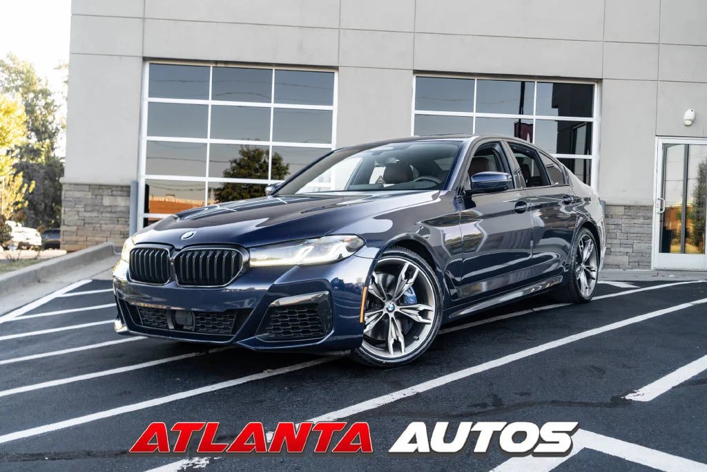 Used 2021 BMW M550i xDrive w/ Executive Package AWD/4WD image 1