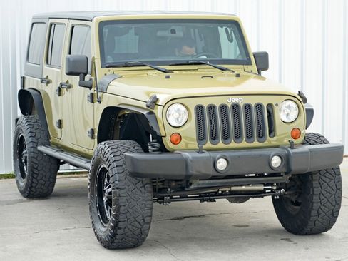 Used 2013 Jeep Wrangler Unlimited Sport w/ Mopar Black Appearance Group image 45