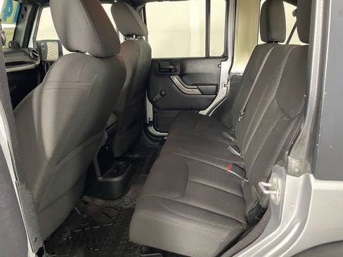 Used 2014 Jeep Wrangler Unlimited Sport w/ Mopar Black Appearance Group image 17