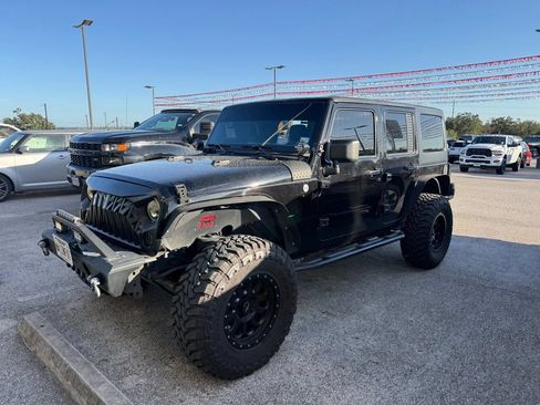 Used 2012 Jeep Wrangler Unlimited Sport AWD/4WD image 1