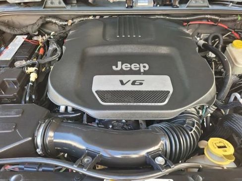 Used 2014 Jeep Wrangler Unlimited Rubicon w/ Dual Top Group image 11