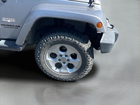 Used 2013 Jeep Wrangler Unlimited Sahara AWD/4WD image 12