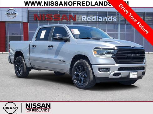 Used 2023 RAM 1500 Laramie AWD/4WD image 1