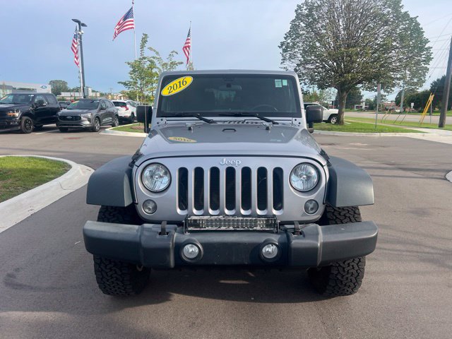 Used 2016 Jeep Wrangler Sport w/ Mopar Black Appearance Group AWD/4WD image 2