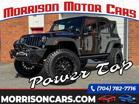 Used 2015 Jeep Wrangler Unlimited Rubicon w/ Dual Top Group AWD/4WD image 1