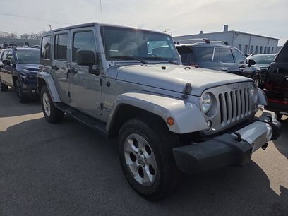 Used 2015 Jeep Wrangler Unlimited Sahara w/ Dual Top Group