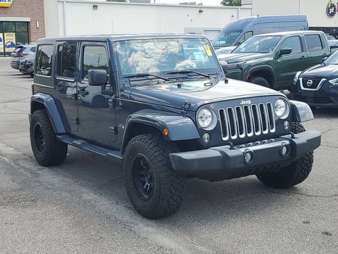 Used 2016 Jeep Wrangler Unlimited Sahara w/ Connectivity Group AWD/4WD image 1