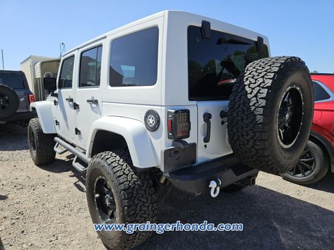 Used 2013 Jeep Wrangler Unlimited Rubicon w/ Dual Top Group AWD/4WD image 10