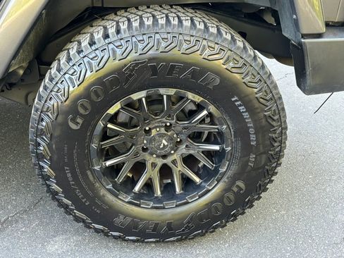 Used 2014 Jeep Wrangler Unlimited Sahara w/ Dual Top Group AWD/4WD image 38