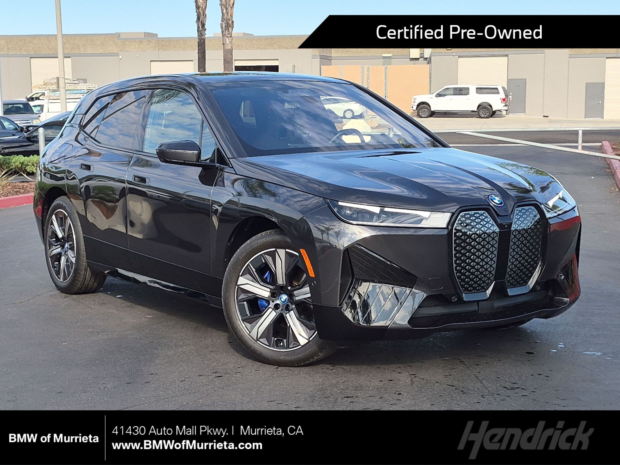 Used 2024 BMW iX xDrive50 w/ Premium Package AWD/4WD image 1