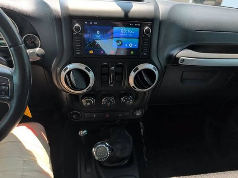 Used 2012 Jeep Wrangler Unlimited Sahara w/ Dual Top Group AWD/4WD image 5
