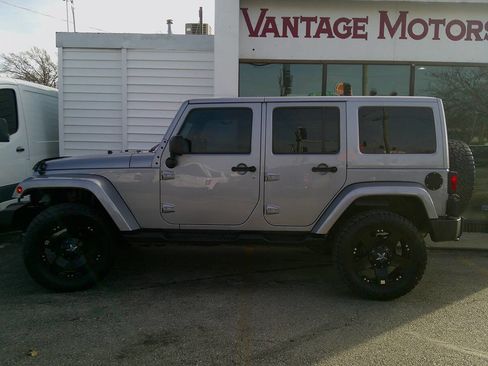 Used 2015 Jeep Wrangler Unlimited Sahara AWD/4WD image 1