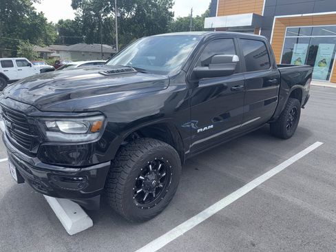 Used 2024 RAM 1500 Laramie AWD/4WD image 1