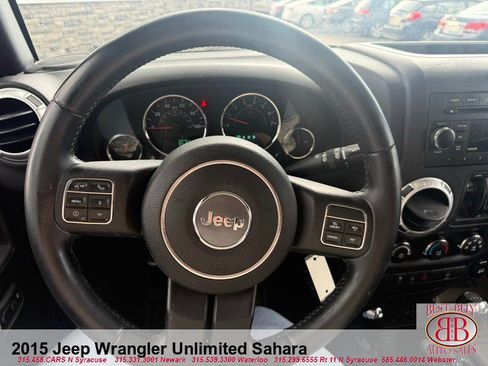 Used 2015 Jeep Wrangler Unlimited Sahara w/ Dual Top Group AWD/4WD image 14