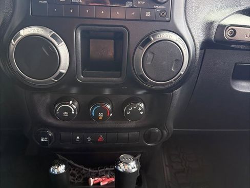 Used 2013 Jeep Wrangler Unlimited Sport w/ Mopar Black Appearance Group AWD/4WD image 16