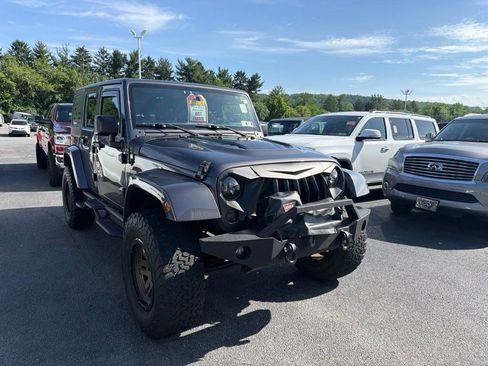 Used 2016 Jeep Wrangler Unlimited Sahara AWD/4WD image 1