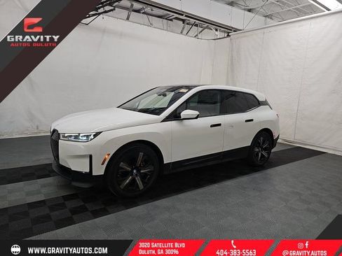 Used 2024 BMW iX xDrive50 w/ Premium Package AWD/4WD image 1