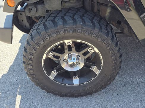 Used 2012 Jeep Wrangler Unlimited Rubicon w/ Dual Top Group image 9