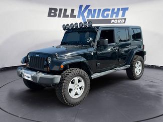 Used 2012 Jeep Wrangler Unlimited Sahara w/ Max Tow Pkg image 1