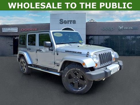 Used 2013 Jeep Wrangler Unlimited Sahara w/ Dual Top Group AWD/4WD image 1