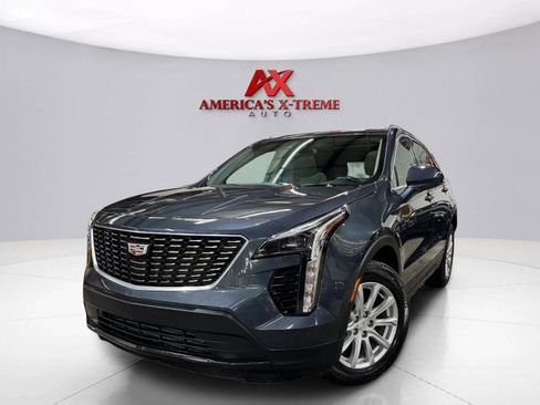 Used 2021 Cadillac XT4 Luxury w/ Cold Weather Package AWD/4WD image 1