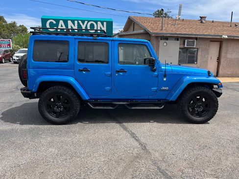 Used 2014 Jeep Wrangler Unlimited Sahara AWD/4WD image 2