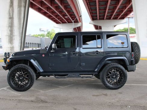 Used 2016 Jeep Wrangler Unlimited Sahara w/ Connectivity Group AWD/4WD image 1