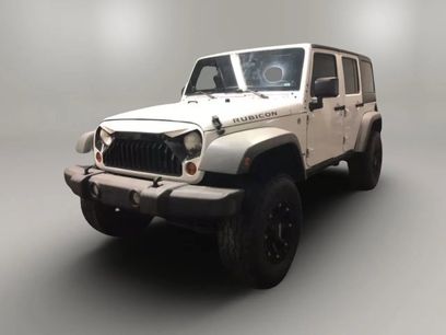 Used 2011 Jeep Wrangler Unlimited Rubicon w/ Dual Top Group