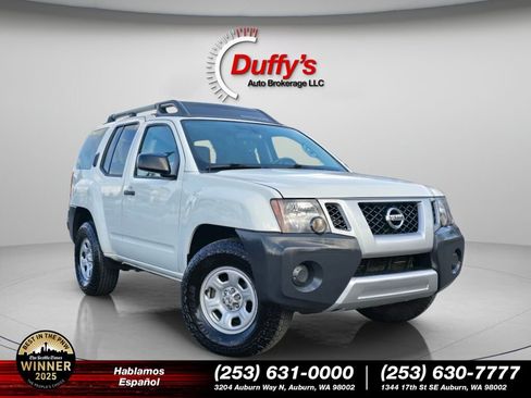 Used 2014 Nissan Xterra X image 1