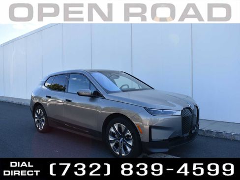 Used 2024 BMW iX xDrive50 w/ Premium Package AWD/4WD image 1
