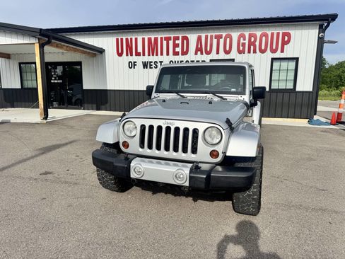 Used 2012 Jeep Wrangler Unlimited Sahara w/ Connectivity Group AWD/4WD image 1