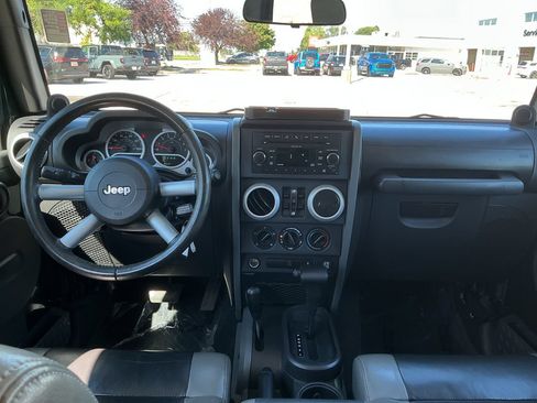 Used 2010 Jeep Wrangler Unlimited Sahara w/ Dual Top Group AWD/4WD image 12