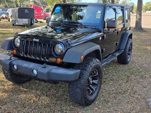 Used 2013 Jeep Wrangler Unlimited Sport AWD/4WD image 1
