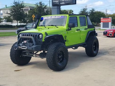 Used 2013 Jeep Wrangler Unlimited Sahara w/ Trailer Tow Group AWD/4WD image 1