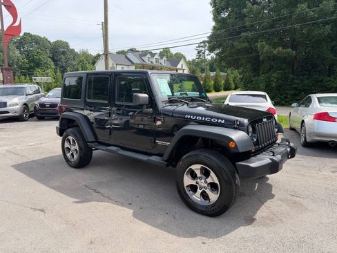 Used 2012 Jeep Wrangler Unlimited Rubicon w/ Dual Top Group AWD/4WD image 3