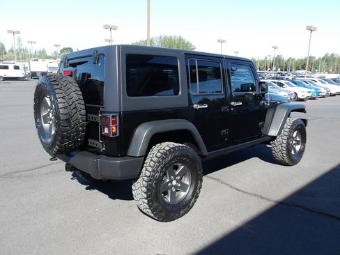 Used 2011 Jeep Wrangler Unlimited Rubicon w/ Dual Top Group AWD/4WD image 5