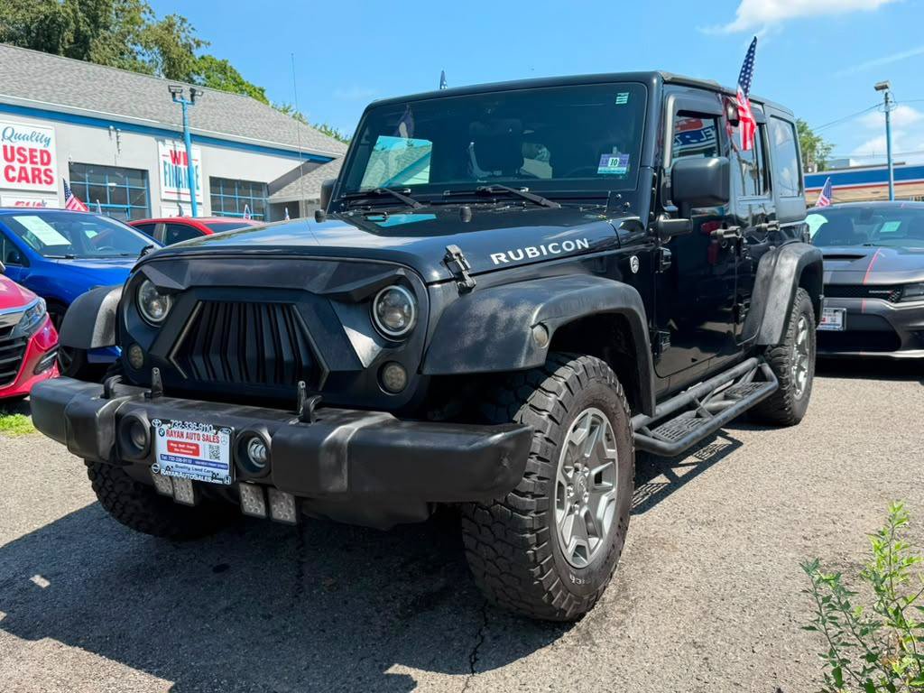 Used 2016 Jeep Wrangler Unlimited Rubicon w/ Dual Top Group AWD/4WD image 12