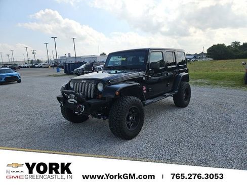 Used 2013 Jeep Wrangler Unlimited Sahara w/ Connectivity Group AWD/4WD image 1