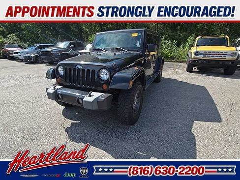 Used 2011 Jeep Wrangler Unlimited Sport AWD/4WD image 1