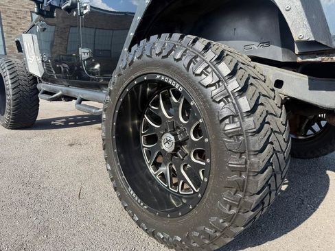 Used 2014 Jeep Wrangler Unlimited Rubicon w/ Dual Top Group AWD/4WD image 27