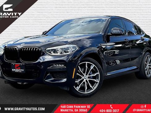 Used 2021 BMW X4 xDrive30i AWD/4WD image 1