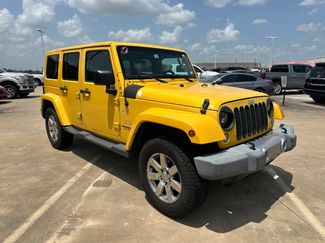 Used 2015 Jeep Wrangler Unlimited Sahara w/ Max Tow Package AWD/4WD video 1