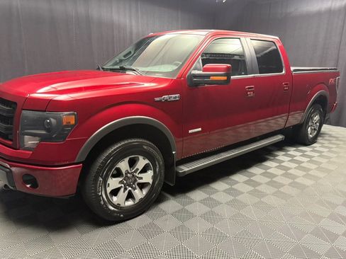 Used 2014 Ford F150 FX4 Pickup 4D 6 1/2 ft w/ Equipment Group 402A Luxury AWD/4WD image 12