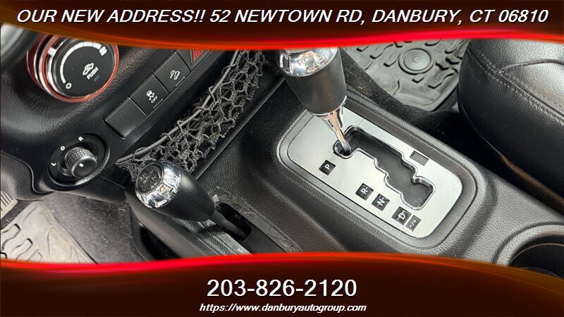 Used 2014 Jeep Wrangler Unlimited Sahara w/ Dual Top Group AWD/4WD image 17