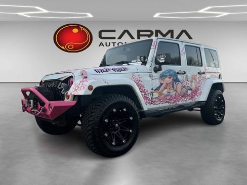 Used 2013 Jeep Wrangler Unlimited Sahara w/ Connectivity Group image 1