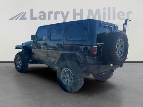 Used 2013 Jeep Wrangler Unlimited Rubicon w/ Dual Top Group AWD/4WD image 3